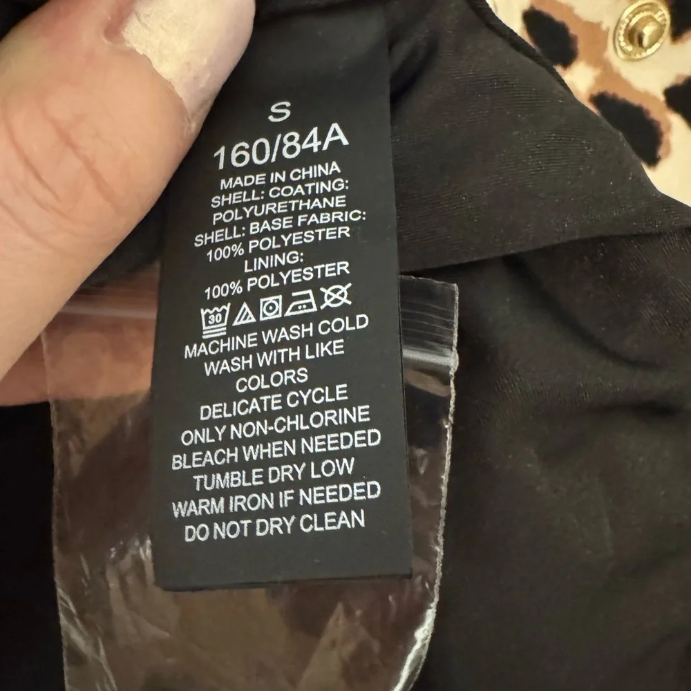 Kate Spade water resistant leopard print a-line raincoat